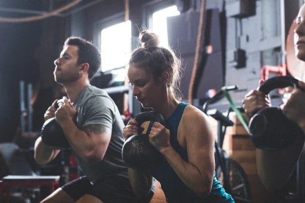 People working out with kettlebells